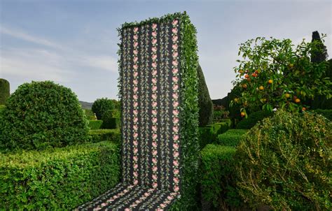 gucci curiosities|The new Gucci Décor selection is presented in a topiary garden .